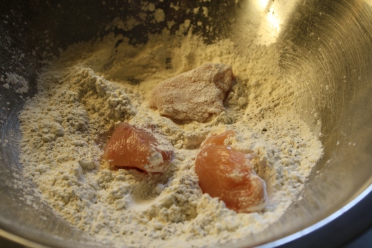 Toss chicken chunks in flour/cornstarch mixture. 